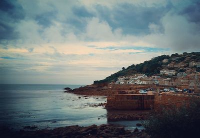Scenic view of calm sea against sky