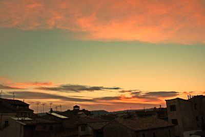 Cityscape against dramatic sky