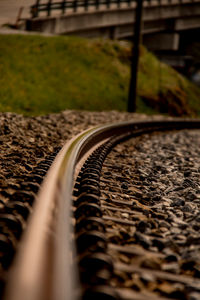 Close-up of railroad track on field