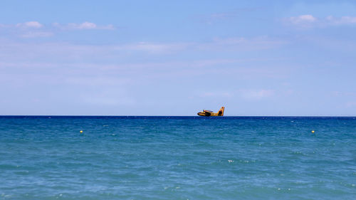 Boat sailing in sea