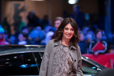 Portrait of a smiling young woman in car