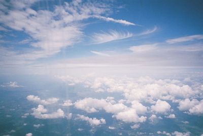 Scenic view of landscape against cloudy sky