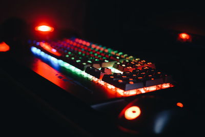 Close-up of illuminated lighting equipment at night