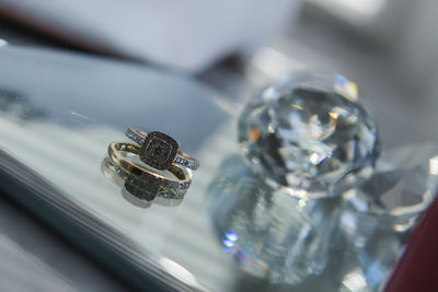Close-up of wedding rings on metal