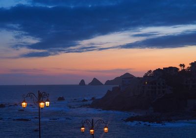 Scenic view of sea against sky at dusk