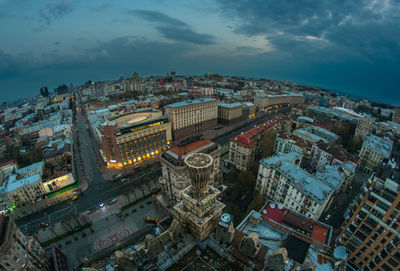 High angle view of illuminated buildings in city