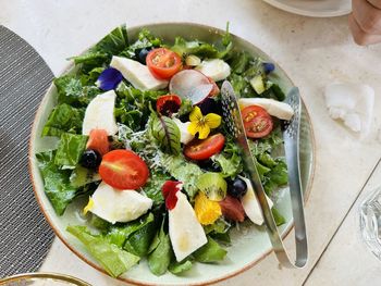 High angle view of salad in plate on table