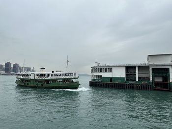 Boats in sea against sky