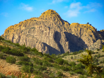 Scenic view of rocky mountains against sky