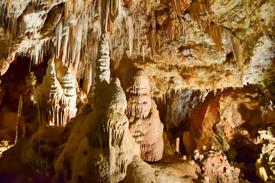 Low angle view of rock formations in cave