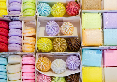 High angle view of multi colored candies in box
