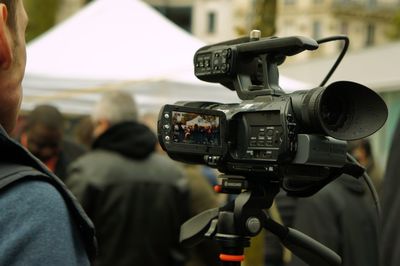 Close-up of photographer photographing