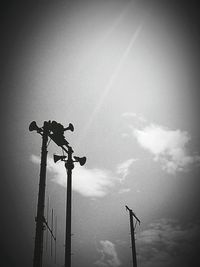 Low angle view of lamp post against sky