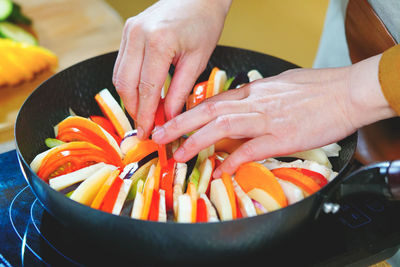 Close-up of person preparing food