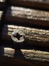 Close-up of metal on table