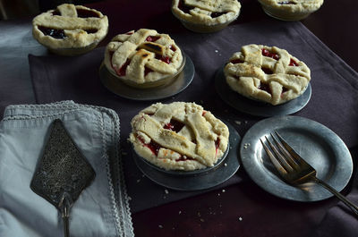 High angle view of mini pies on table