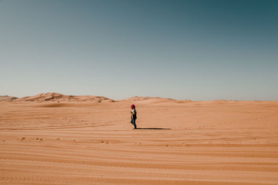 Scenic view of desert against clear sky