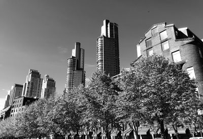 Low angle view of modern buildings against clear sky