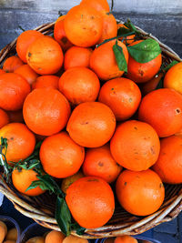 High angle view of oranges in container