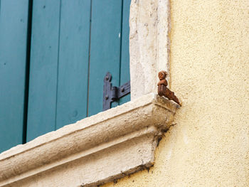 Close-up of window on building wall