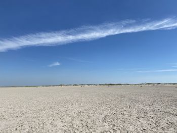 Sky and sand - scenic view of beach against blue sky