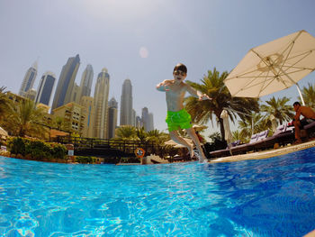 Man swimming in pool