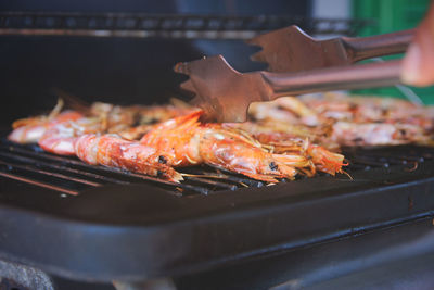 Close-up of fish on barbecue grill