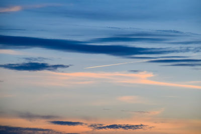 Low angle view of clouds in sky during sunset