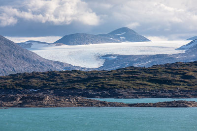 Scenic view of sea and mountains