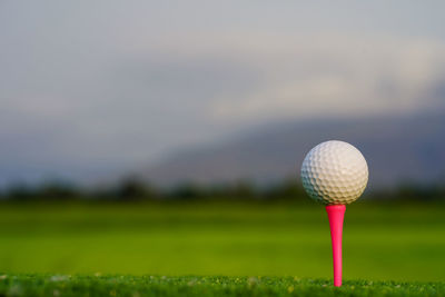 Golf ball on grass