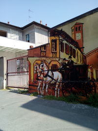 Graffiti on wall of building in city