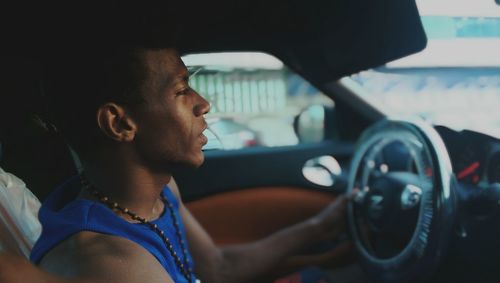 Portrait of man in car