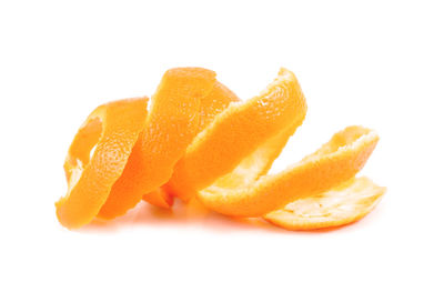 Close-up of orange slice against white background