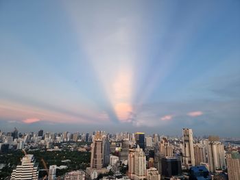 Cityscape against sky during sunset