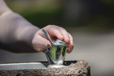 Close-up of hand holding ice cream