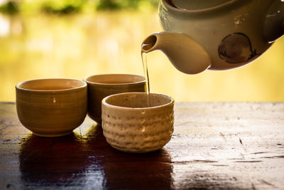 Close-up of coffee cup on table