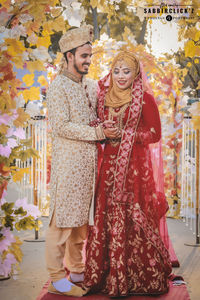 Young couple standing outdoors