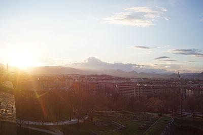 Cityscape against sky during sunset