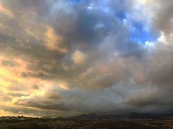 Storm clouds over city