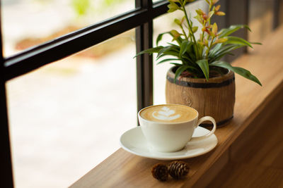 Close-up of coffee served on table