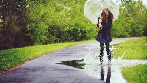 Woman walking on rainy day