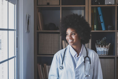 Doctor near window in clinic