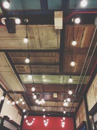 Low angle view of illuminated ceiling