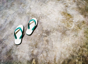 High angle view of shoes on floor