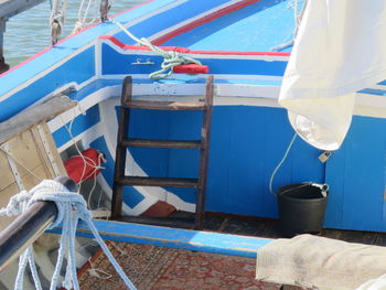 Close-up of ship moored at harbor