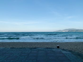 Scenic view of sea against blue sky