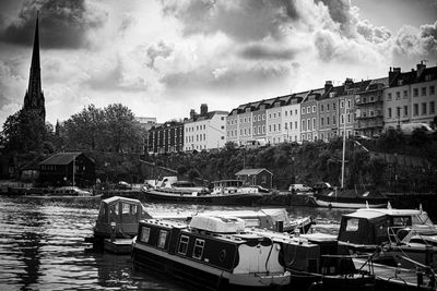 Panoramic view of buildings in city against sky