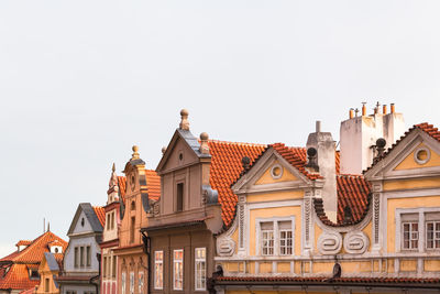 Buildings in city against sky