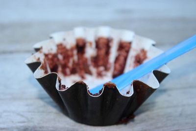 Close-up of empty cupcake holder on table