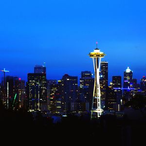 Illuminated buildings in city at night